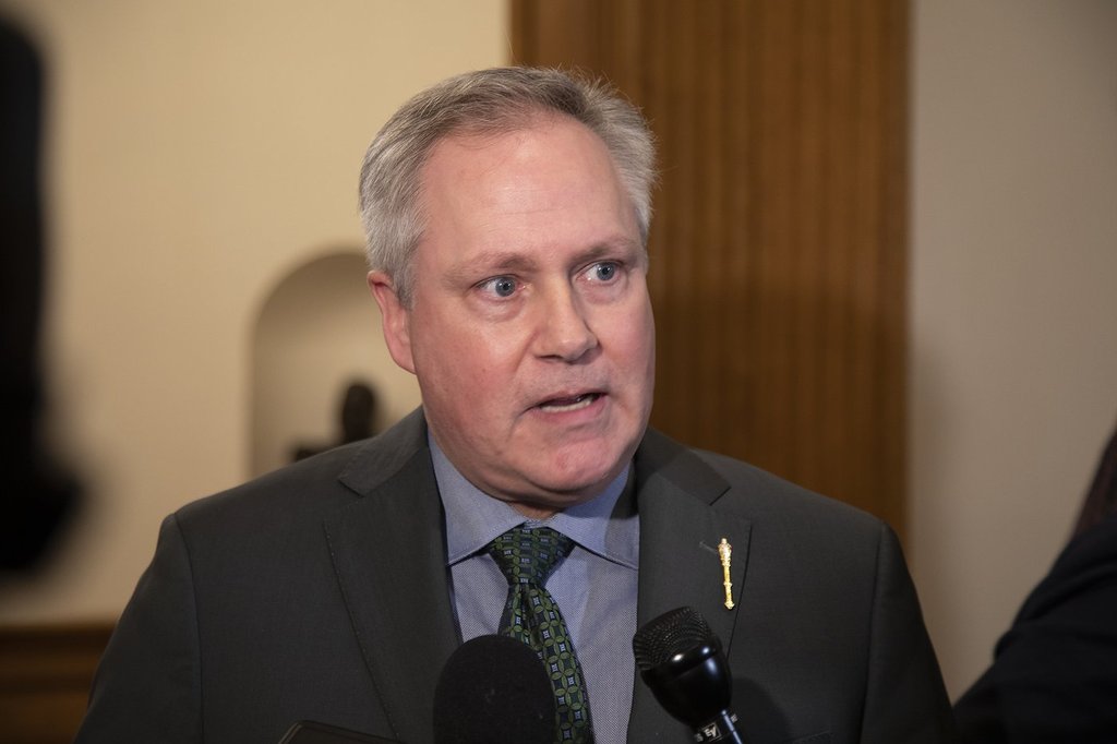 New Brunswick Progressive Conservative Leader Glen Savoie responds to reporters' questions on Tuesday March 18, 2025. THE CANADIAN PRESS/Ron Ward.