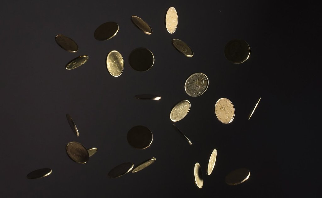 Canadian coins falling
