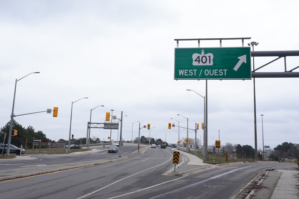 Ontario Provincial Police are investigating after reports of gunfire on Highway 401 in Mississauga left one person injured by shattered glass debris. 