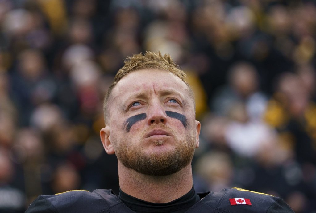 Hamilton Tiger Cats quarterback Bo Levi Mitchell (19) CFL East Final football game action against the Montreal Alouettes, in Hamilton, Ont., Saturday, Nov. 8, 2025. THE CANADIAN PRESS/Peter Power.