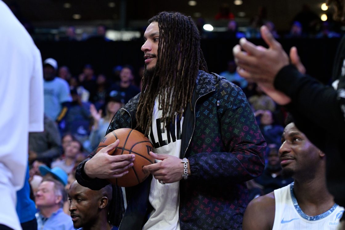Memphis Grizzlies forward Brandon Clarke looks on from the bench in the second half of an NBA basketball game against the Minnesota Timberwolves Tuesday, Feb. 3, 2026, in Memphis, Tenn. (AP Photo/Brandon Dill).