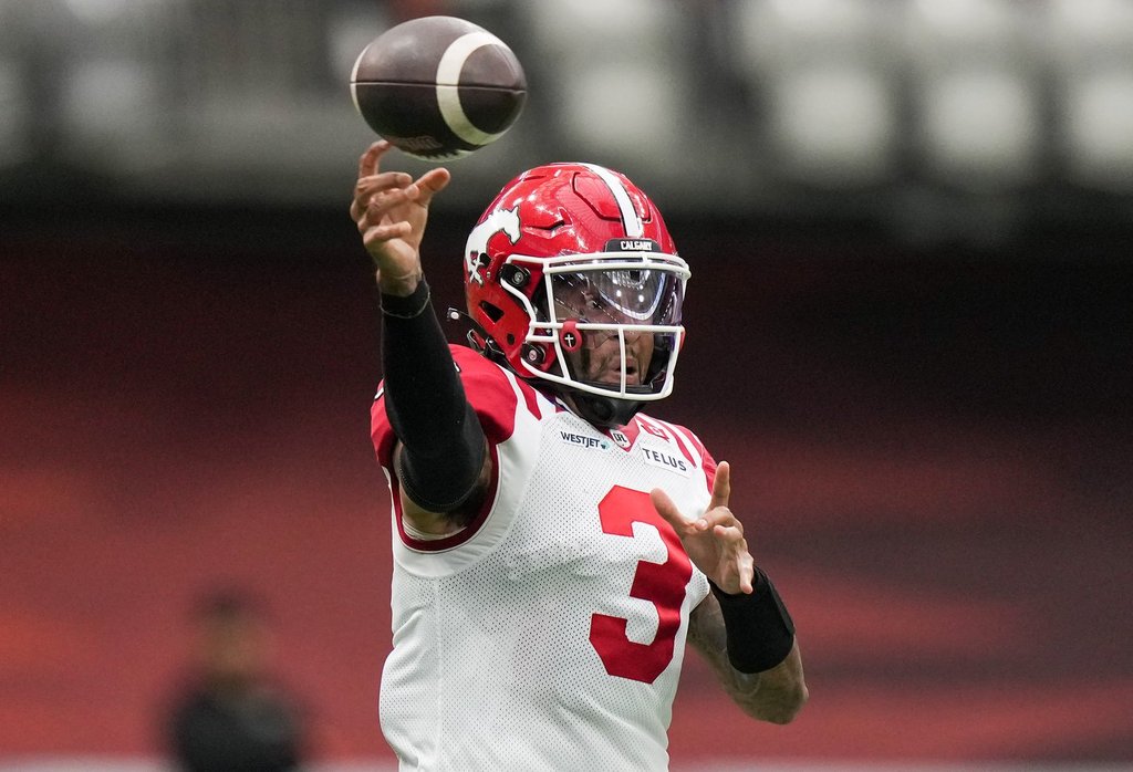 Calgary Stampeders quarterback Vernon Adams Jr. passes during the first half of the CFL western semifinal football game against the B.C. Lions, in Vancouver, on Saturday, November 1, 2025. THE CANADIAN PRESS/Darryl Dyck.