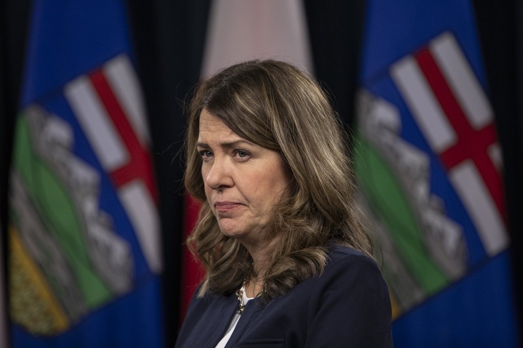 Premier Danielle Smith speaks to the media at the Legislature in Edmonton, on Wednesday, December 10, 2025.
