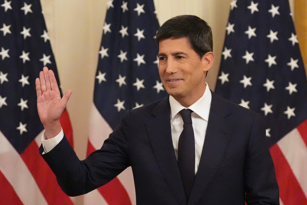 Kevin Warsh gestures as President Donald Trump speaks during Warsh's swearing in as Chairman of the Federal Reserve in the East Room of the White House, Friday, May 22, 2026, in Washington. (AP Photo/Alex Brandon).