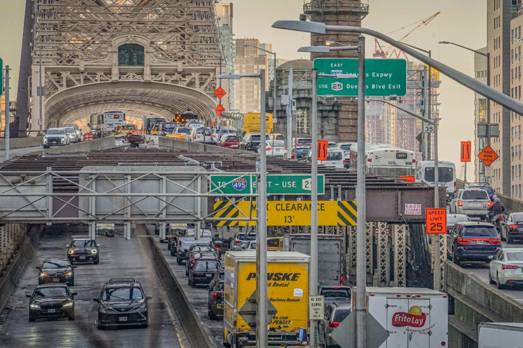 A file photo of traffic entering and leaving mid-town Manhattan via the Queensboro Bridge, Thursday, Feb. 8, 2024, in New York.