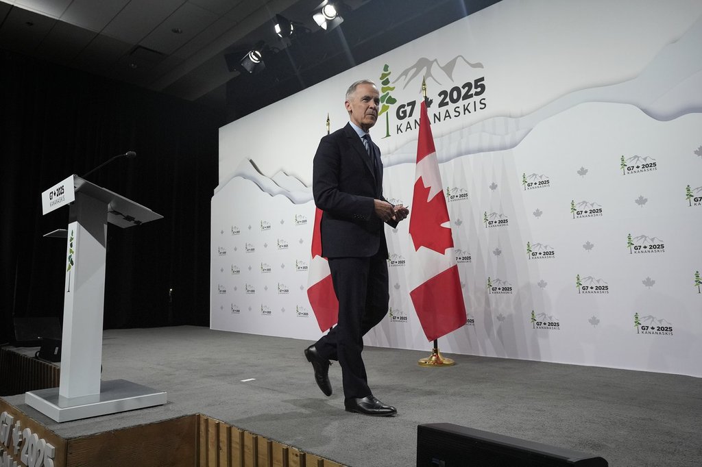 Prime Minister Mark Carney leaves the podium following the closing news conference at the G7 Summit in Kananaskis, Alta., Tuesday, June 17, 2025.