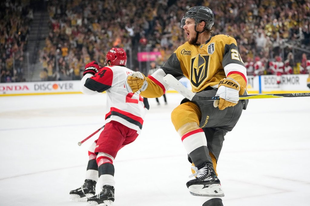 Vegas Golden Knights centre Brett Howden, right, celebrates his goal as Carolina Hurricanes right wing Seth Jarvis skates away during the second period in Game 4 of the NHL hockey Stanley Cup final series Tuesday, June 9, 2026, in Las Vegas.