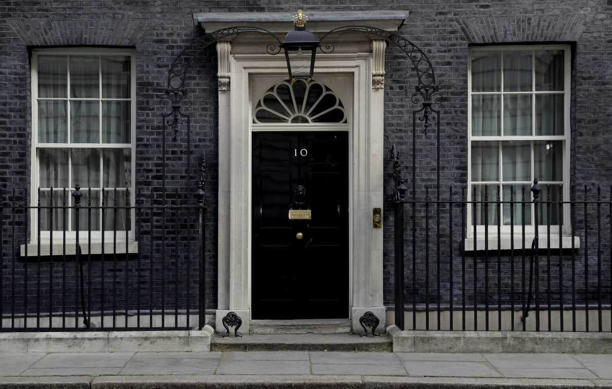 FILE – View at the closed door of 10 Downing Street in London, April 7, 2020.