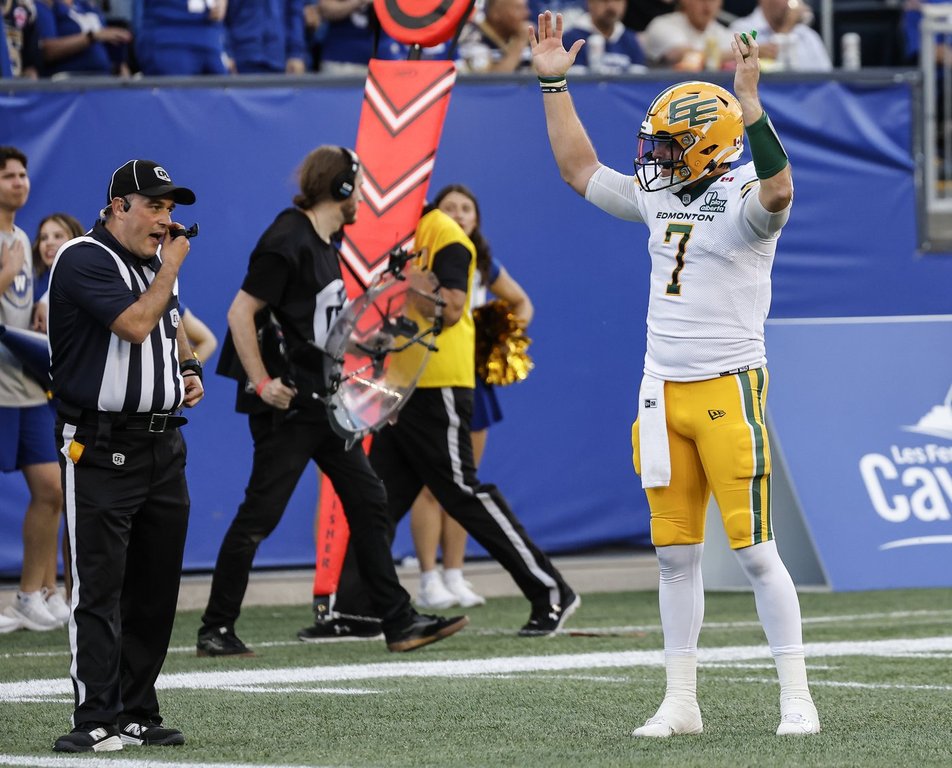Edmonton Elks quarterback Cody Fajardo (7) disputes a no touchdown call by the referees during CFL action against the Blue Bombers in Winnipeg on June 25, 2026. THE CANADIAN PRESS/John Woods.