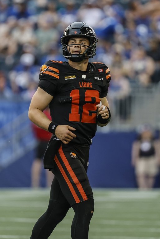 B.C. Lions quarterback Nathan Rourke (12) looks up at the scoreboard against the Winnipeg Blue Bombers during first half CFL pre-season football action in Winnipeg on Friday, May 29, 2026. THE CANADIAN PRESS/John Woods.