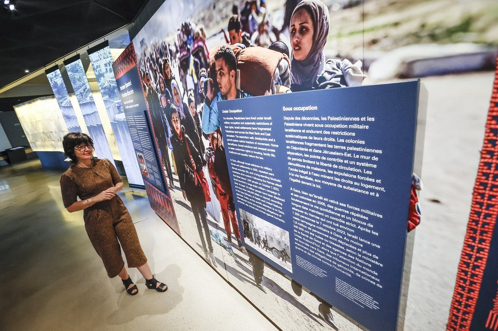 Isabelle Masson, curator, views the new exhibit, Palestine Uprooted - Nakba Past and Present, that she created at the Canadian Museum for Human Rights (CMHR) in Winnipeg, Friday, June 26, 2026. THE CANADIAN PRESS/John Woods.
