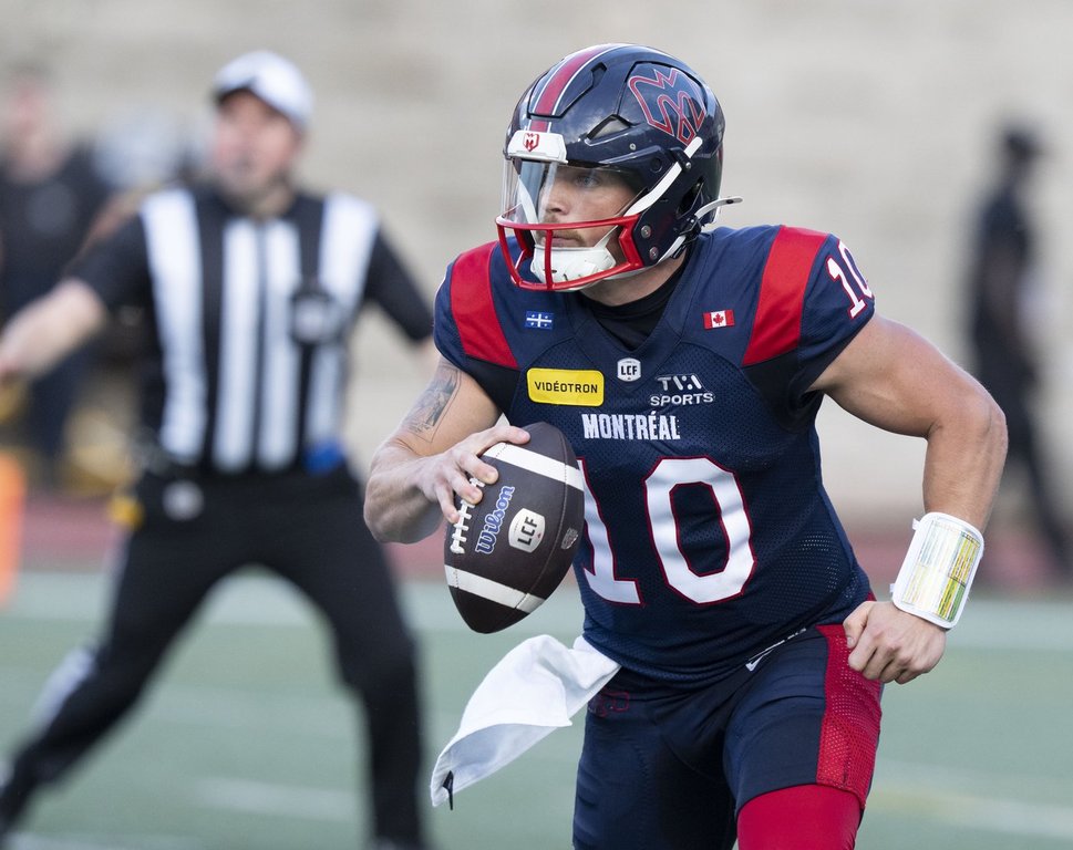 Montreal Alouettes quarterback Davis Alexander (10) runs with the ball during first half CFL football action against the Toronto Argonauts, in Montreal on Friday, June 12, 2026. THE CANADIAN PRESS/Christinne Muschi.