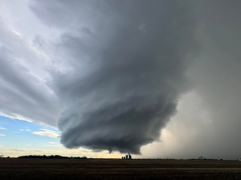 A funnel cloud forming near Girouxville, Alta. on Monday, June 15, 2026. 