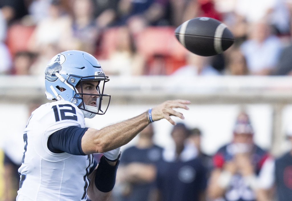 Toronto Argonauts quarterback Chad Kelly (12) throws during first half CFL football action against the Montreal Alouettes, in Montreal on Friday, June 12, 2026. THE CANADIAN PRESS/Christinne Muschi.