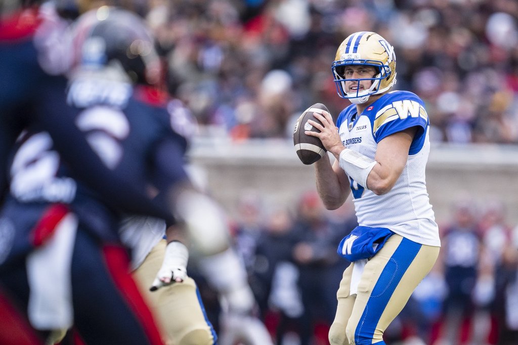 Winnipeg Blue Bombers quarterback Zach Collaros (8) looks to throw the ball during second half Eastern semi-final action against the Montreal Alouettes, in Montreal on Saturday, Nov. 1, 2025. THE CANADIAN PRESS/Christopher Katsarov.