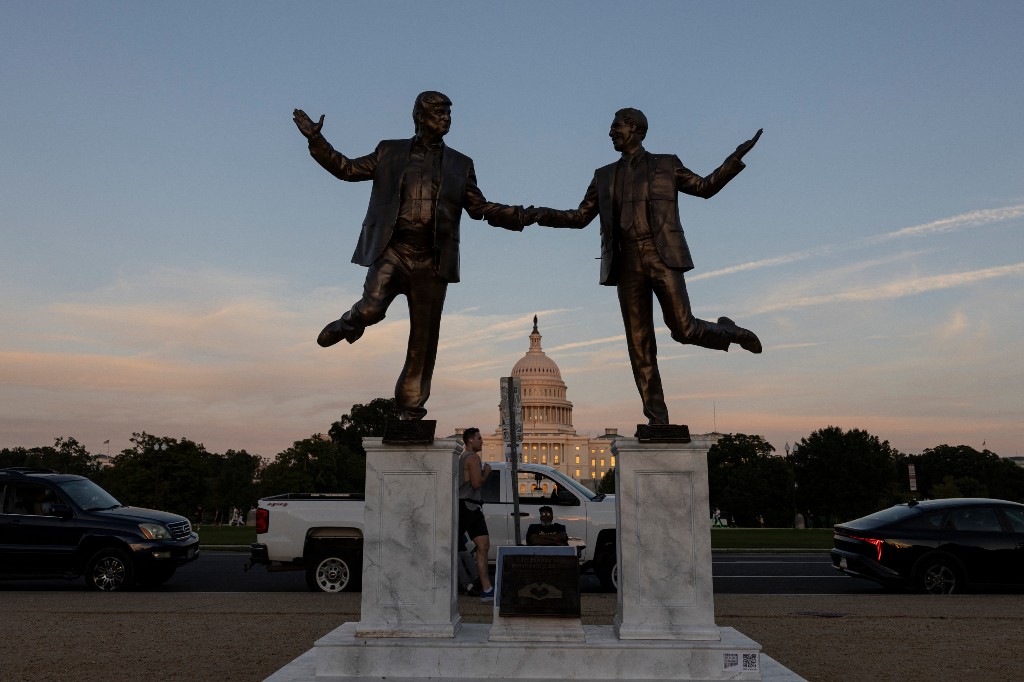 A statue depicting U.S. President Donald Trump and Jeffrey Epstein holding hands is seen near the U.S. Capitol in Washington, D.C., USA on October 2, 2025.