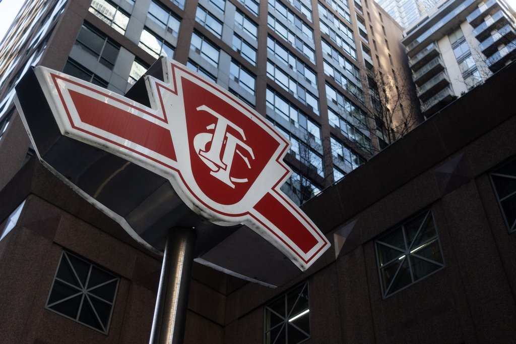 A Toronto Transit Commission sign is shown at a downtown Toronto subway stop Tuesday, Jan. 31, 2023. New data from Toronto's transit agency shows safety incidents against customers went down in the month of February after police boosted their presence in the system in late January.