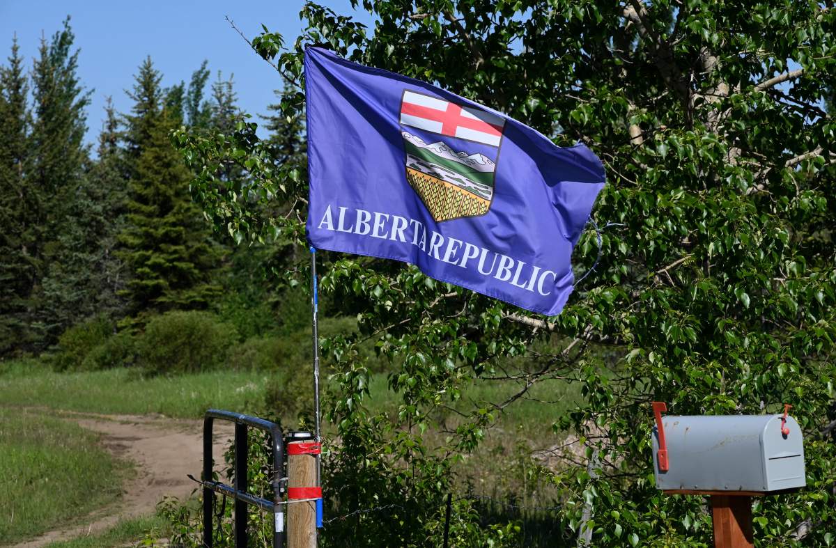 An Alberta provincial flag with the words Alberta Republic added is pictured along Highway 20 near Breton, Alberta on June 19 2026. THE CANADIAN PRESS IMAGES/Don Denton