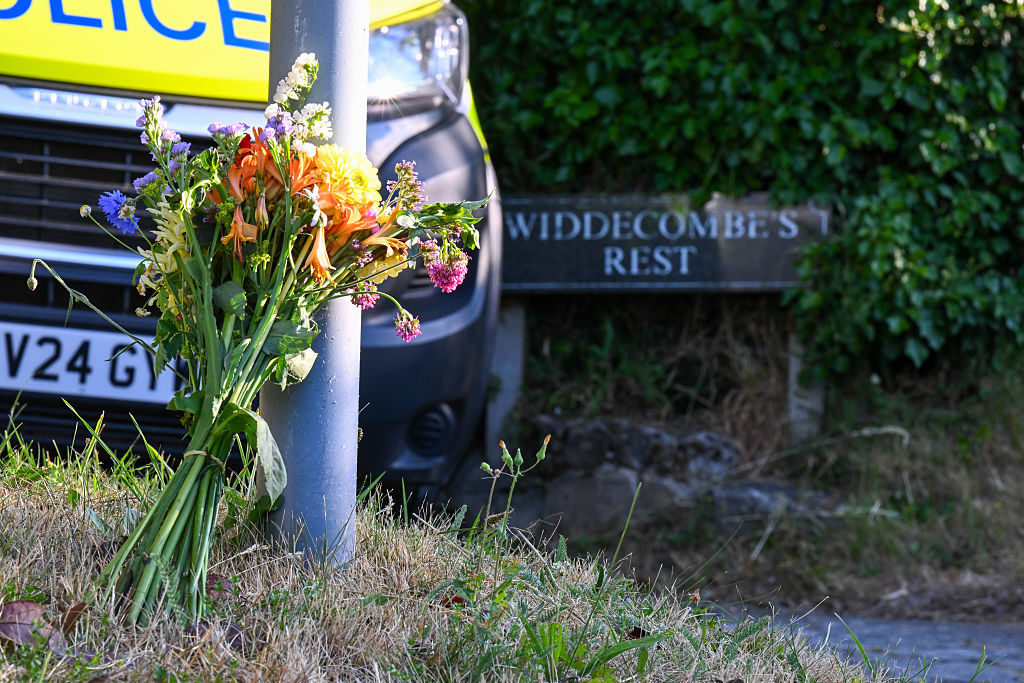 Flowers are seen outside the house of Ann Widdecombe in Haytor on July 11, 2026 in Dartmoor, United Kingdom. The former Conservative Minister and MP for Maidstone and The Weald was found dead at her home on Dartmoor on Thursday morning having sustained serious head injuries.