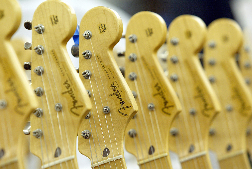 Stratocaster guitars at the Fender manufacturing facility in Corona, California, 28 June 2004. The sainted grandfather of electric guitars, the Fender Stratocaster, famously cradled on stage by music legends from Buddy Holly to Jimi Hendrix and Eric Clapton is celebrating it's 50 anniversary this year.