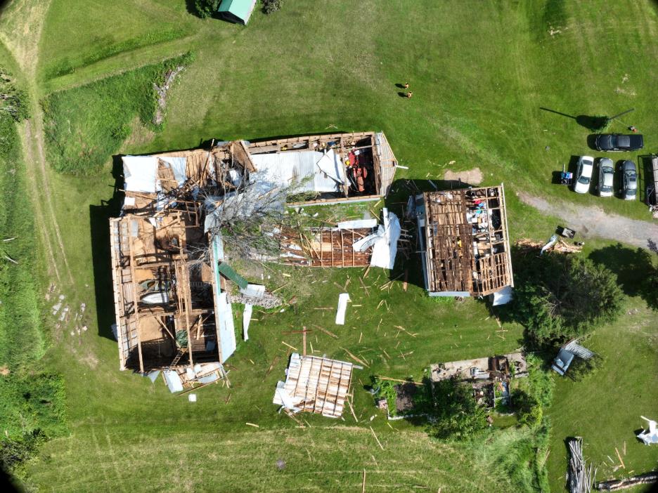 Drone footage by the Northern Tornadoes Project shows roof damage to a large barn caused by an EF0 tornado in Verona, Ont., on June 30.