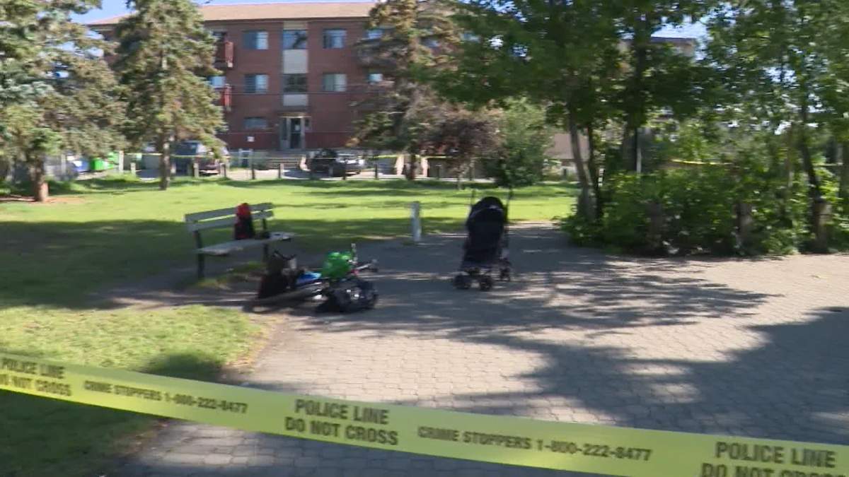 Police tape surrounds an area of Sunalta Cottage School Park, steps away from the nearby CTrain station, after officers were called out to investigate a stabbing early Tuesday morning.