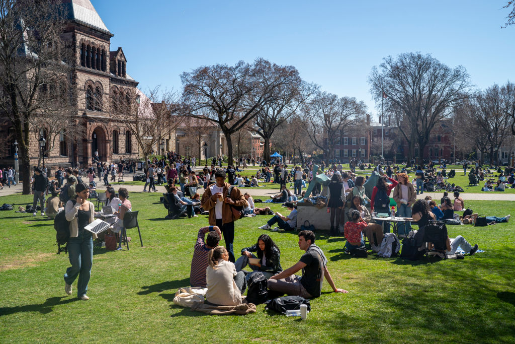 Students attending Brown University walk through the main campus March 19, 2025 in Providence, Rhode Island.